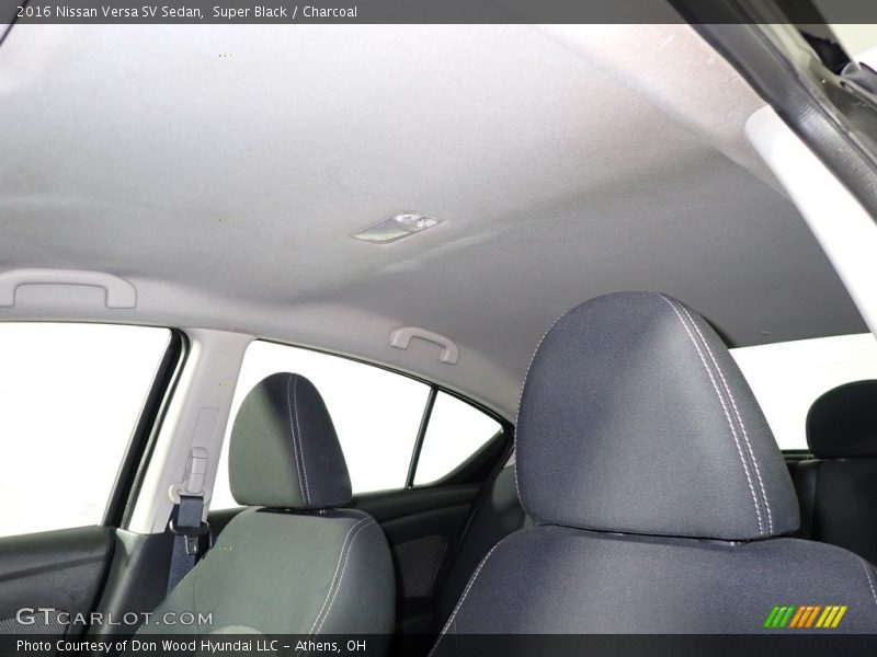 Super Black / Charcoal 2016 Nissan Versa SV Sedan