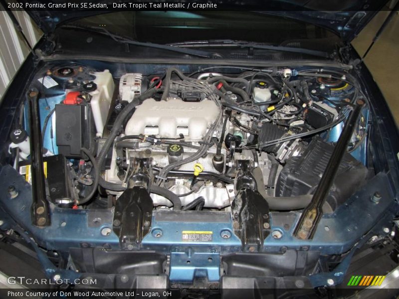 Dark Tropic Teal Metallic / Graphite 2002 Pontiac Grand Prix SE Sedan