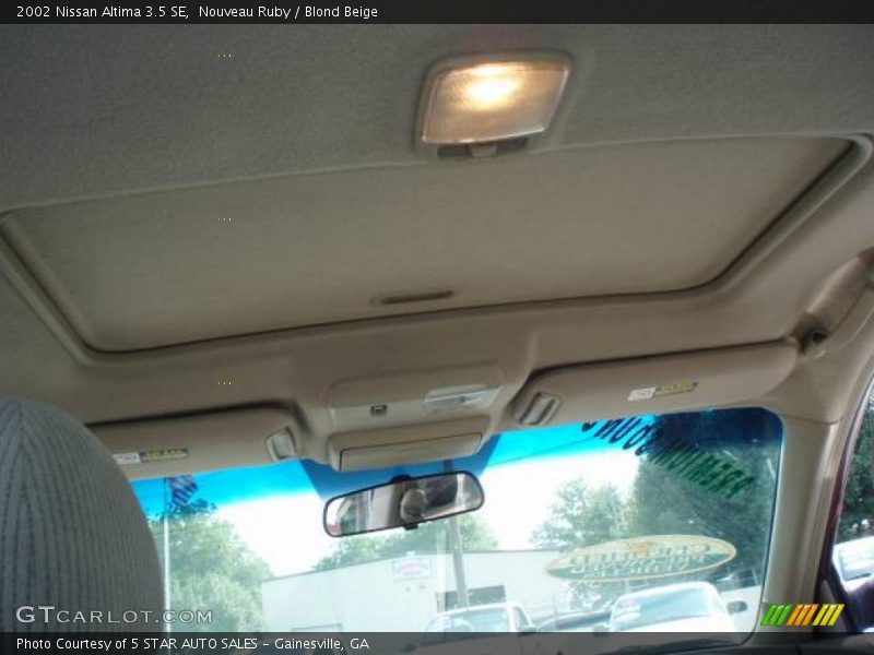 Nouveau Ruby / Blond Beige 2002 Nissan Altima 3.5 SE