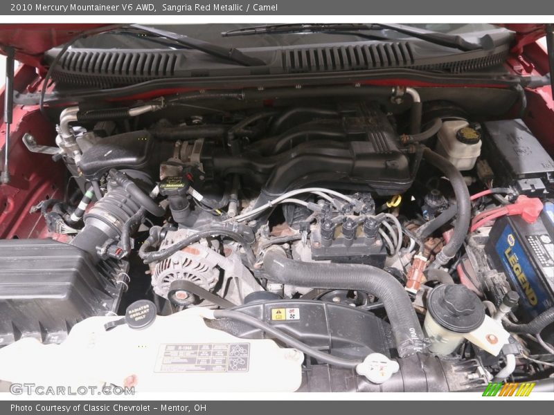 Sangria Red Metallic / Camel 2010 Mercury Mountaineer V6 AWD