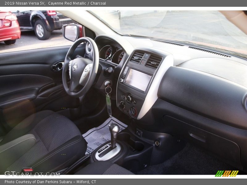 Cayenne Red Metallic / Charcoal 2019 Nissan Versa SV