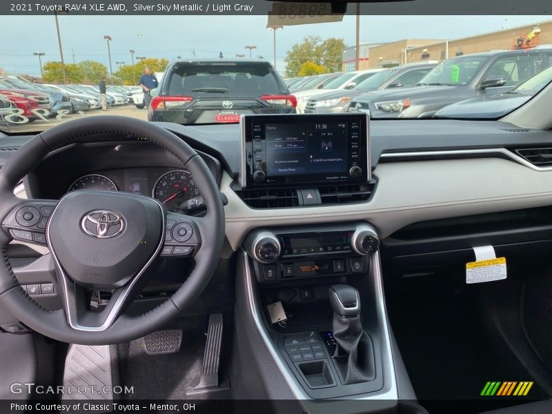 Silver Sky Metallic / Light Gray 2021 Toyota RAV4 XLE AWD