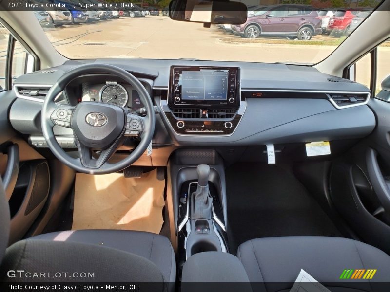 Super White / Black 2021 Toyota Corolla LE