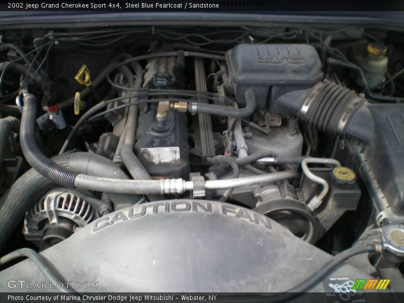Steel Blue Pearlcoat / Sandstone 2002 Jeep Grand Cherokee Sport 4x4
