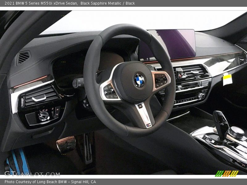 Black Sapphire Metallic / Black 2021 BMW 5 Series M550i xDrive Sedan