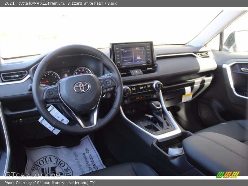 Blizzard White Pearl / Black 2021 Toyota RAV4 XLE Premium