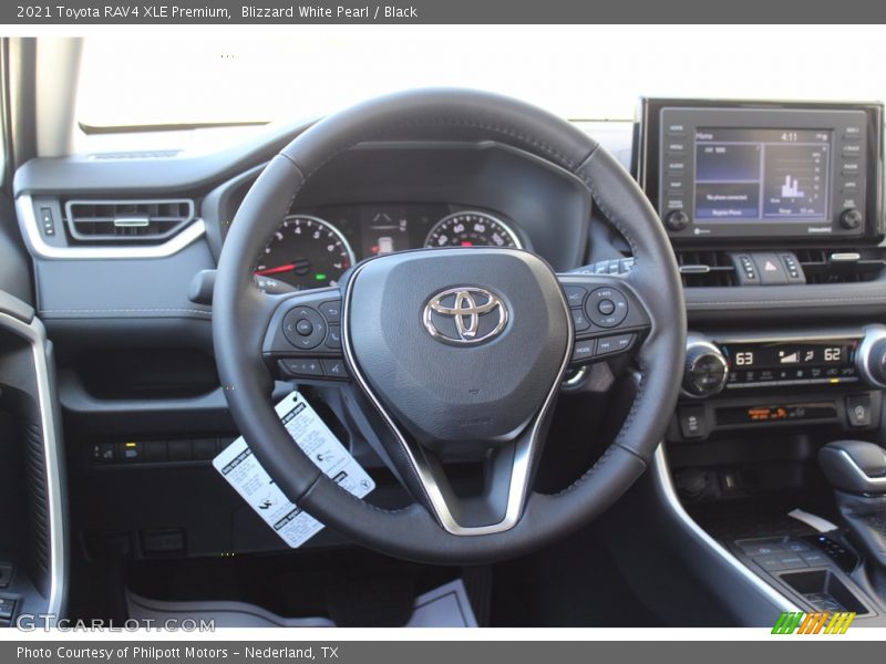 Blizzard White Pearl / Black 2021 Toyota RAV4 XLE Premium