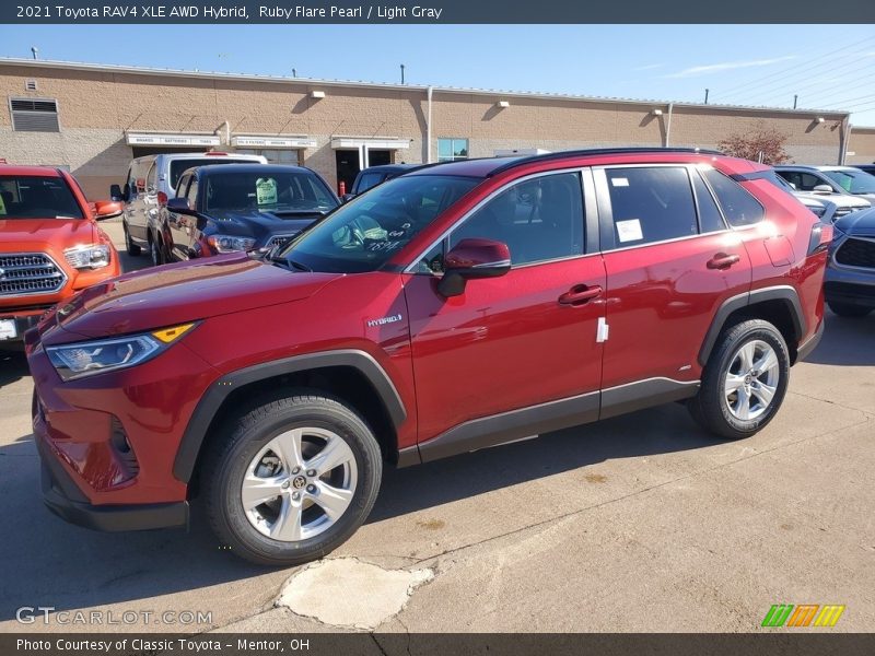 Front 3/4 View of 2021 RAV4 XLE AWD Hybrid