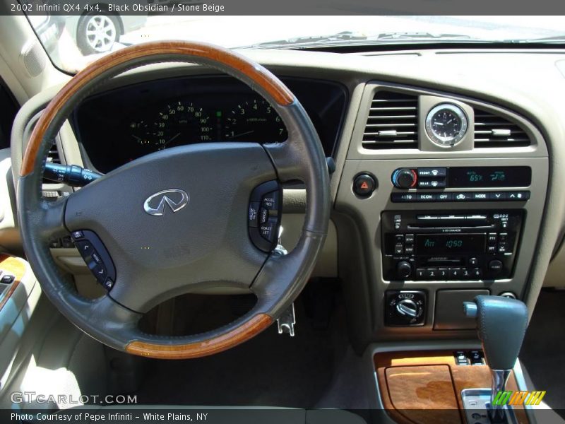 Black Obsidian / Stone Beige 2002 Infiniti QX4 4x4