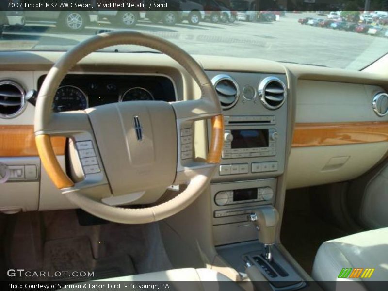 Vivid Red Metallic / Sand 2007 Lincoln MKZ AWD Sedan