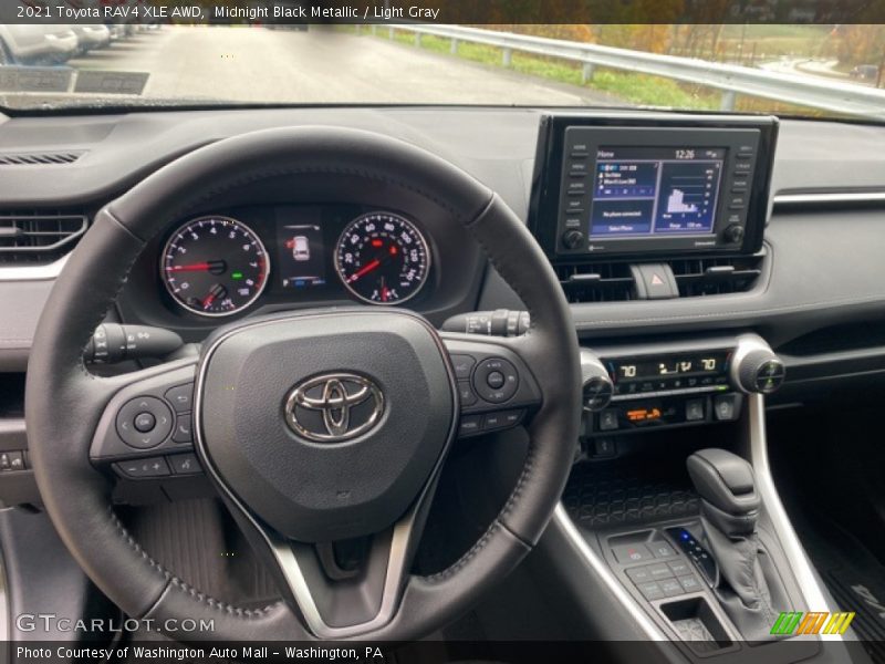 Midnight Black Metallic / Light Gray 2021 Toyota RAV4 XLE AWD