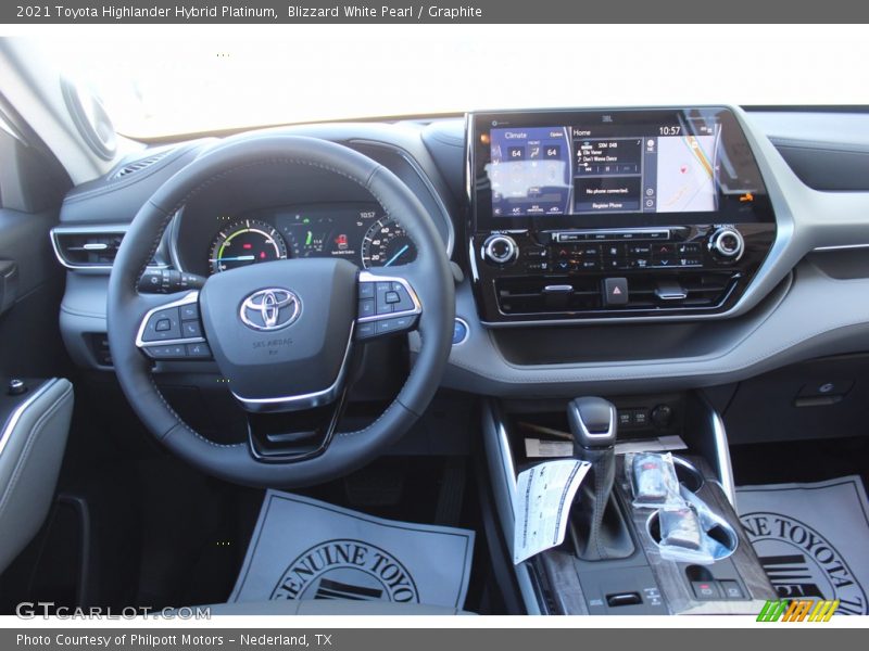 Blizzard White Pearl / Graphite 2021 Toyota Highlander Hybrid Platinum