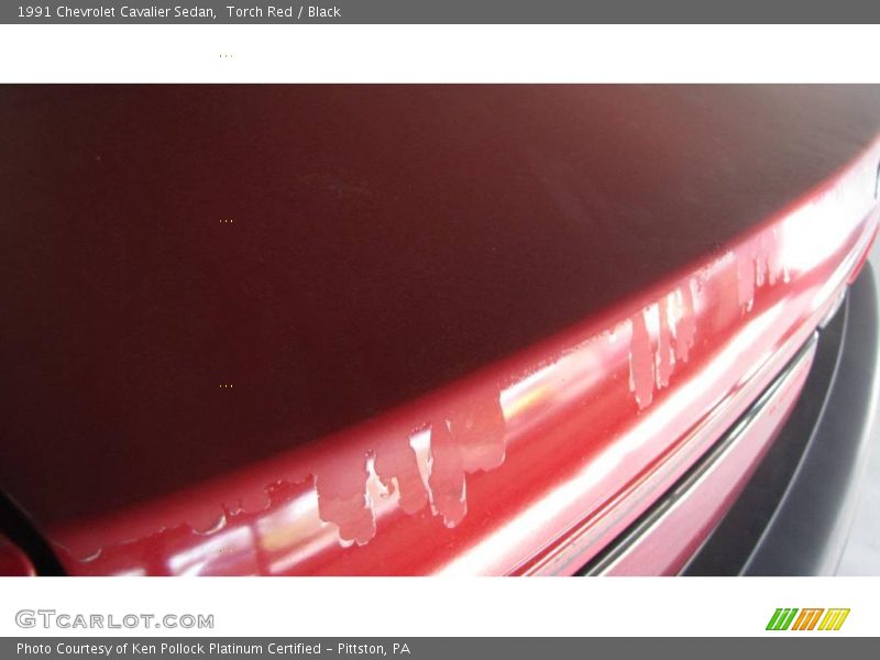 Torch Red / Black 1991 Chevrolet Cavalier Sedan