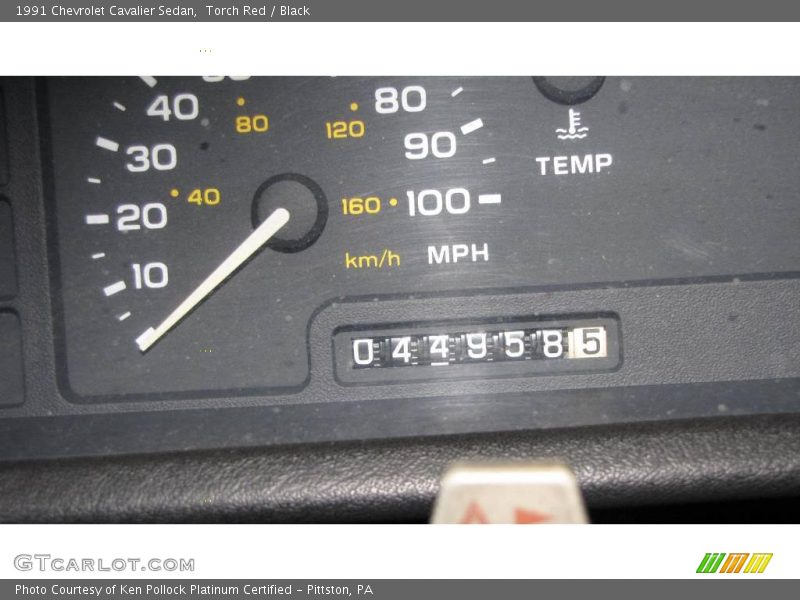Torch Red / Black 1991 Chevrolet Cavalier Sedan