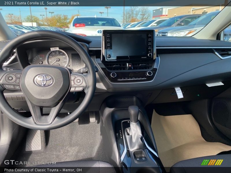 Super White / Black 2021 Toyota Corolla LE