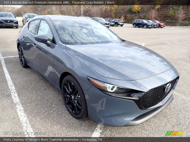 Front 3/4 View of 2021 Mazda3 Premium Hatchback AWD