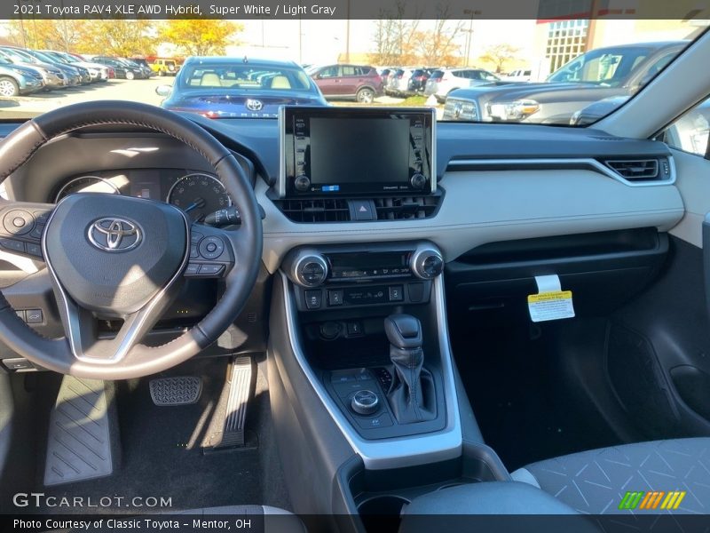 Super White / Light Gray 2021 Toyota RAV4 XLE AWD Hybrid