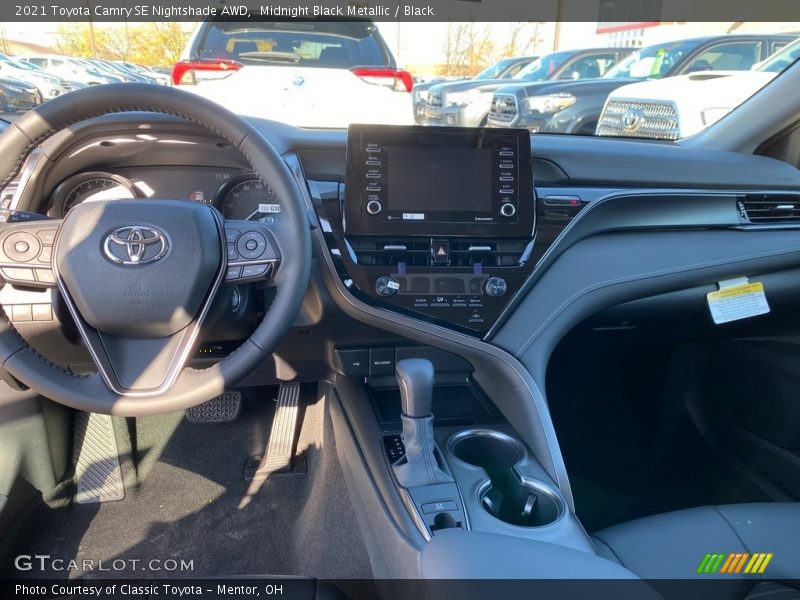 Midnight Black Metallic / Black 2021 Toyota Camry SE Nightshade AWD
