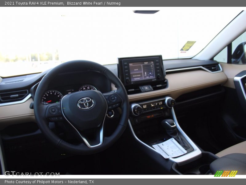 Blizzard White Pearl / Nutmeg 2021 Toyota RAV4 XLE Premium