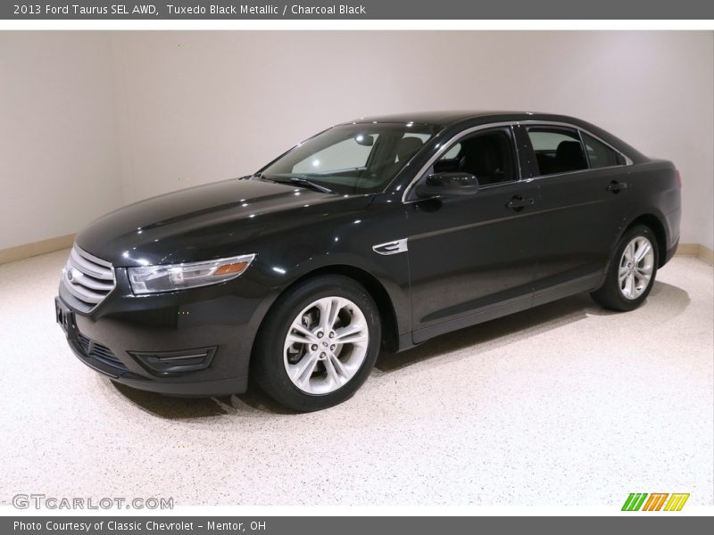 Tuxedo Black Metallic / Charcoal Black 2013 Ford Taurus SEL AWD