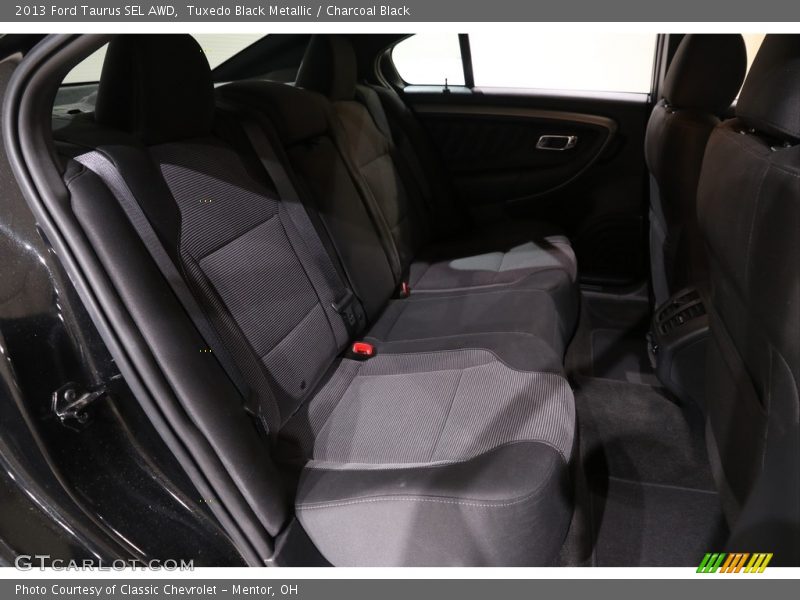 Tuxedo Black Metallic / Charcoal Black 2013 Ford Taurus SEL AWD