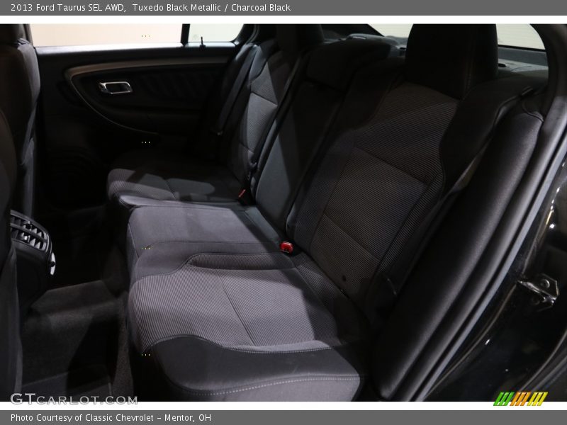 Tuxedo Black Metallic / Charcoal Black 2013 Ford Taurus SEL AWD