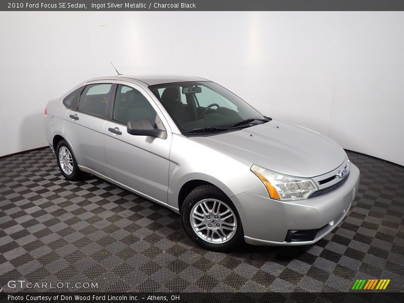 Ingot Silver Metallic / Charcoal Black 2010 Ford Focus SE Sedan
