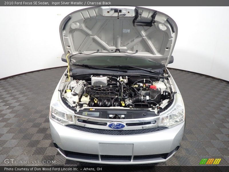 Ingot Silver Metallic / Charcoal Black 2010 Ford Focus SE Sedan