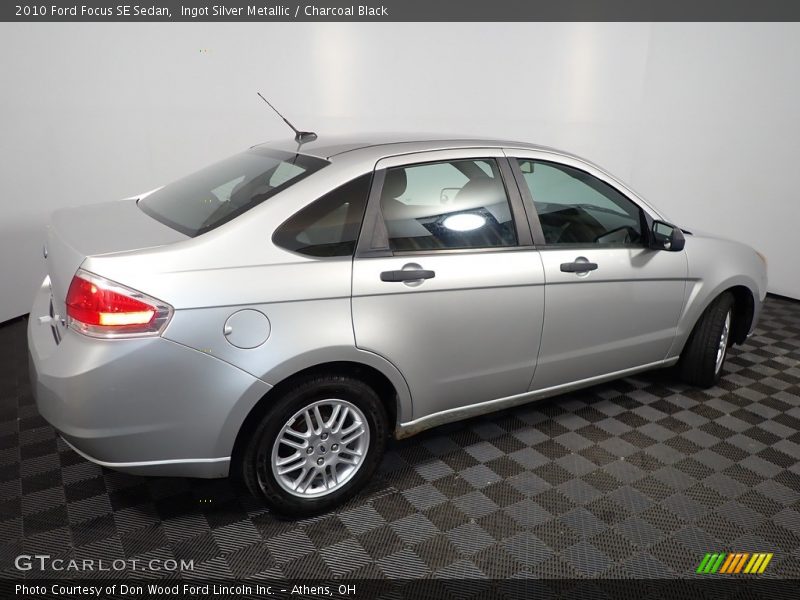 Ingot Silver Metallic / Charcoal Black 2010 Ford Focus SE Sedan