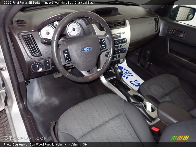Ingot Silver Metallic / Charcoal Black 2010 Ford Focus SE Sedan