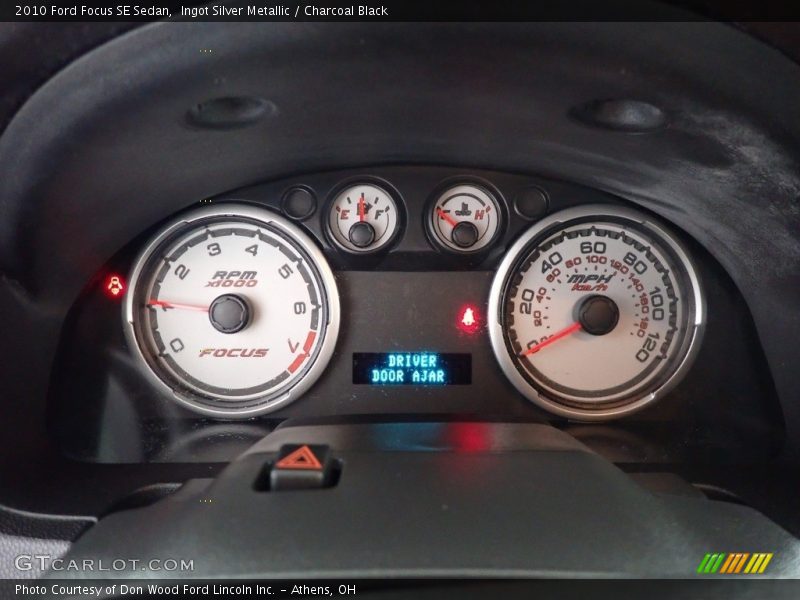 Ingot Silver Metallic / Charcoal Black 2010 Ford Focus SE Sedan