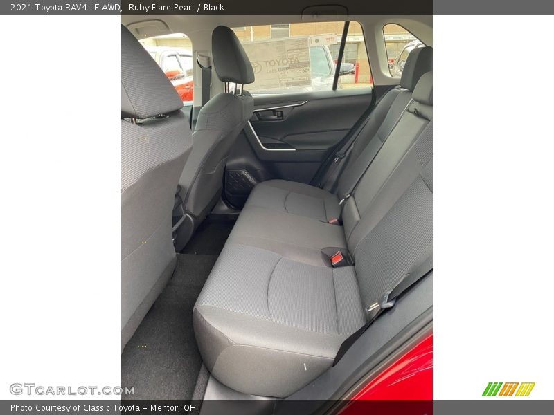 Ruby Flare Pearl / Black 2021 Toyota RAV4 LE AWD