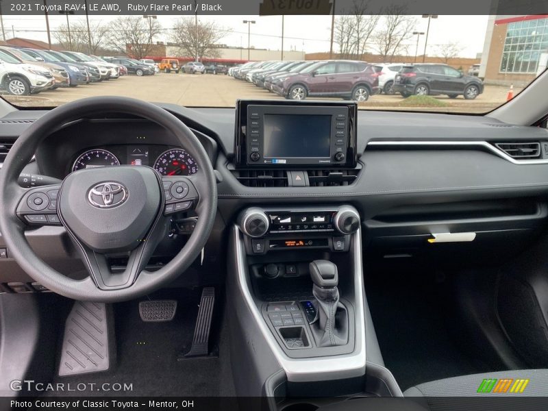 Ruby Flare Pearl / Black 2021 Toyota RAV4 LE AWD