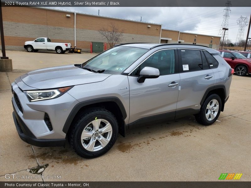 Front 3/4 View of 2021 RAV4 XLE AWD Hybrid