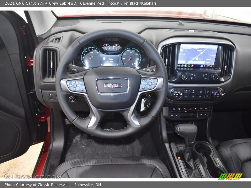 Cayenne Red Tintcoat / Jet Black/Kalahari 2021 GMC Canyon AT4 Crew Cab 4WD