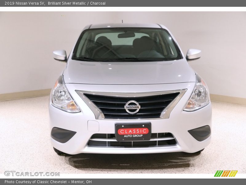 Brilliant Silver Metallic / Charcoal 2019 Nissan Versa SV