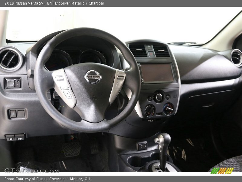 Brilliant Silver Metallic / Charcoal 2019 Nissan Versa SV