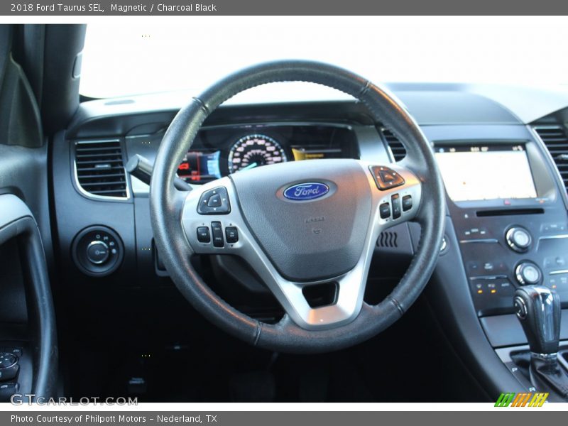 Magnetic / Charcoal Black 2018 Ford Taurus SEL