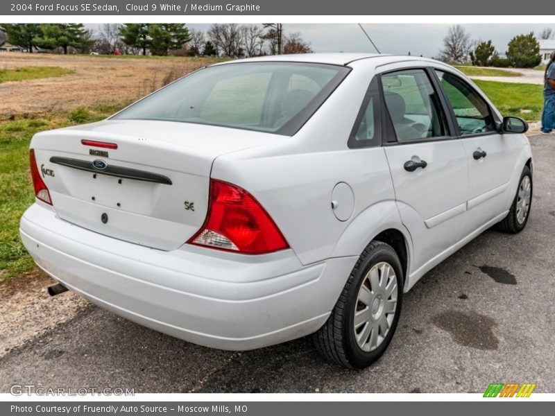 Cloud 9 White / Medium Graphite 2004 Ford Focus SE Sedan