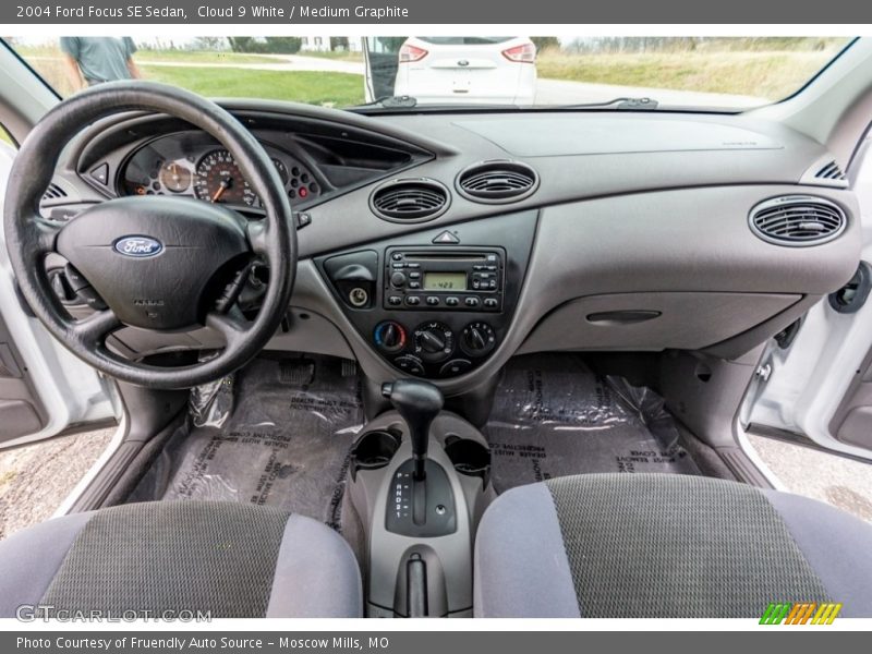 Cloud 9 White / Medium Graphite 2004 Ford Focus SE Sedan