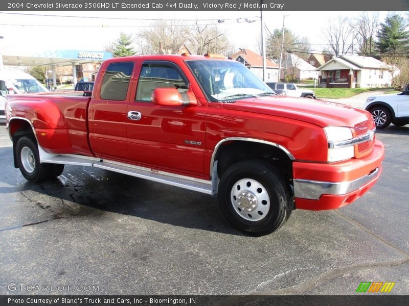 Front 3/4 View of 2004 Silverado 3500HD LT Extended Cab 4x4 Dually