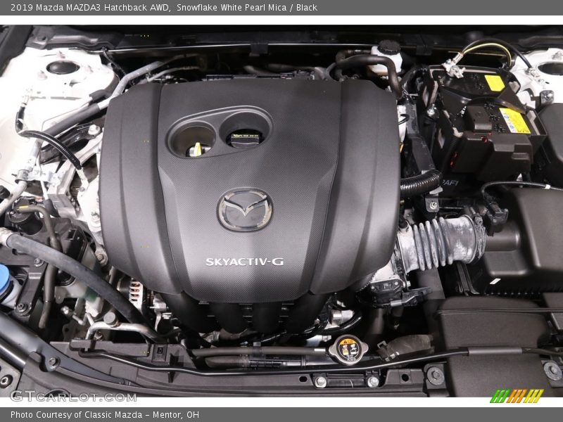 Snowflake White Pearl Mica / Black 2019 Mazda MAZDA3 Hatchback AWD