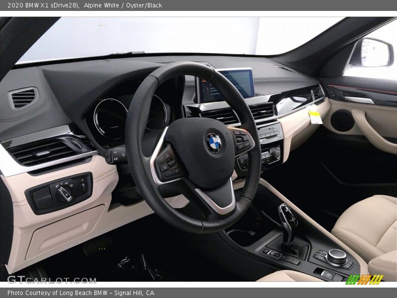 Alpine White / Oyster/Black 2020 BMW X1 sDrive28i
