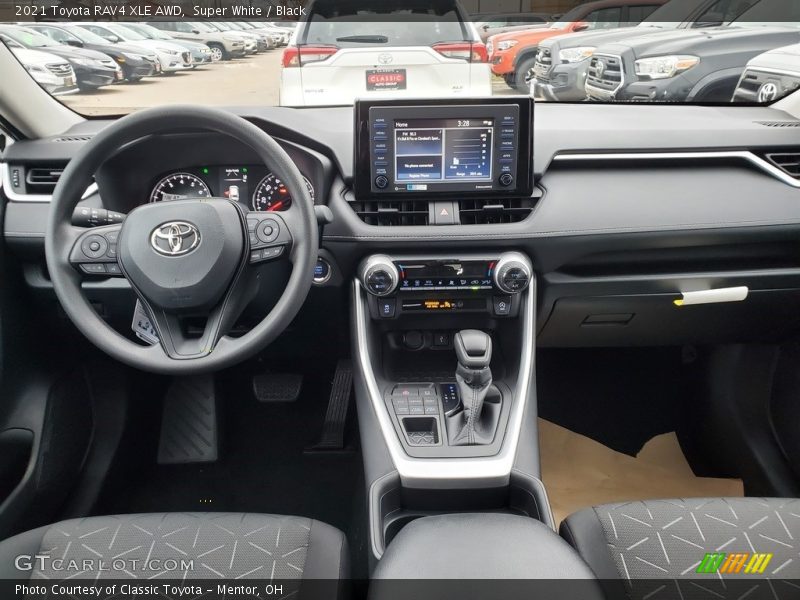 Super White / Black 2021 Toyota RAV4 XLE AWD