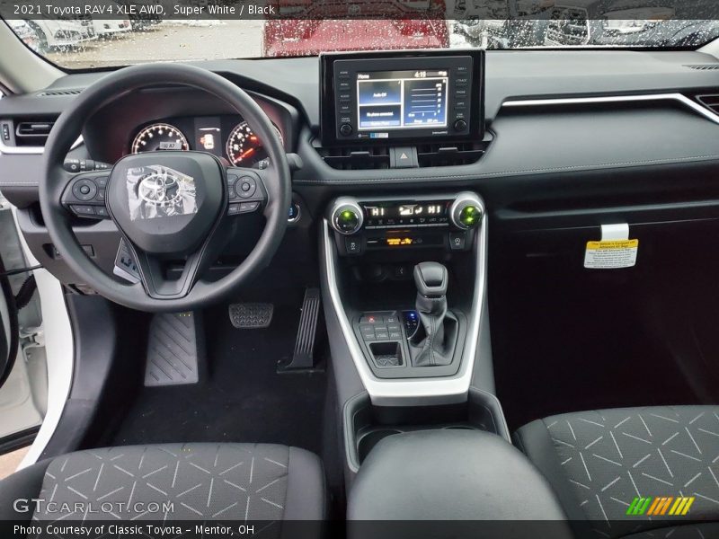 Super White / Black 2021 Toyota RAV4 XLE AWD
