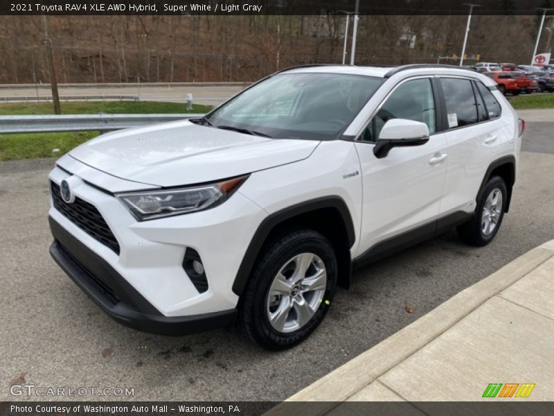 Front 3/4 View of 2021 RAV4 XLE AWD Hybrid