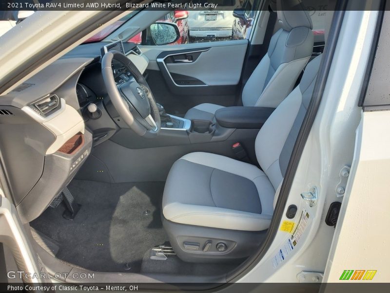 Blizzard White Pearl / Light Gray 2021 Toyota RAV4 Limited AWD Hybrid