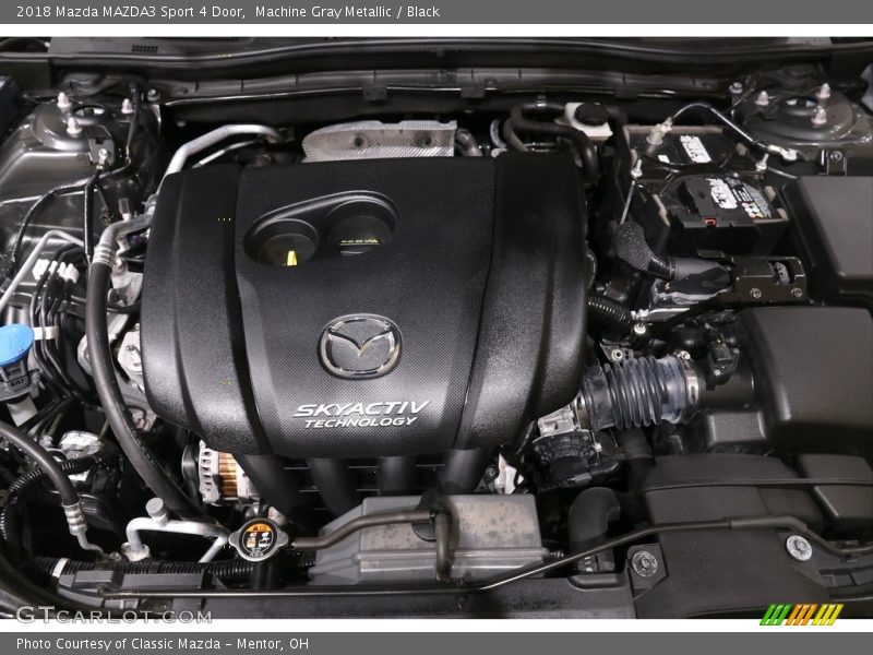 Machine Gray Metallic / Black 2018 Mazda MAZDA3 Sport 4 Door
