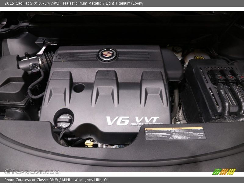 Majestic Plum Metallic / Light Titanium/Ebony 2015 Cadillac SRX Luxury AWD
