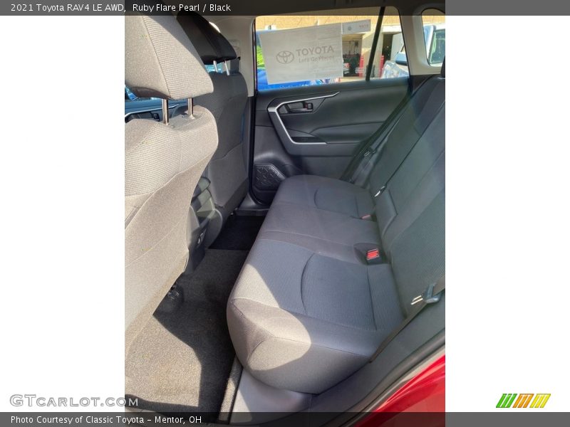 Ruby Flare Pearl / Black 2021 Toyota RAV4 LE AWD